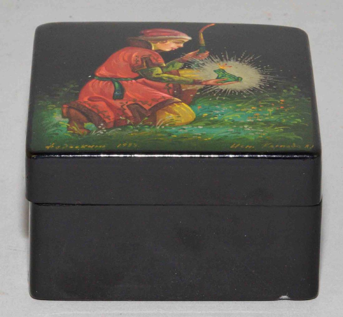 RUSSIAN LACQUER BOX, FEDDSKIND, ''The Frog Princess''.: RUSSIAN LACQUER BOX, FEDDSKIND, ''The Frog Princess''. Signed and dated on top. 1.75''H x 3''W x 3''D.