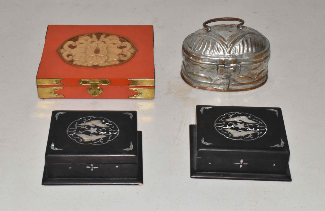 COLLECTION OF FOUR DECORATIVE BOXES. Largest: 1.75''H x: COLLECTION OF FOUR DECORATIVE BOXES. Largest: 1.75''H x 7.5''W x 6''D.