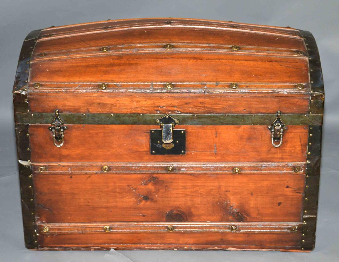 ANTIQUE WOOD AND METAL HUMP BACK CHEST. 23.5''H x 34''L: ANTIQUE WOOD AND METAL HUMP BACK CHEST. 23.5''H x 34''L x 19.5''D.