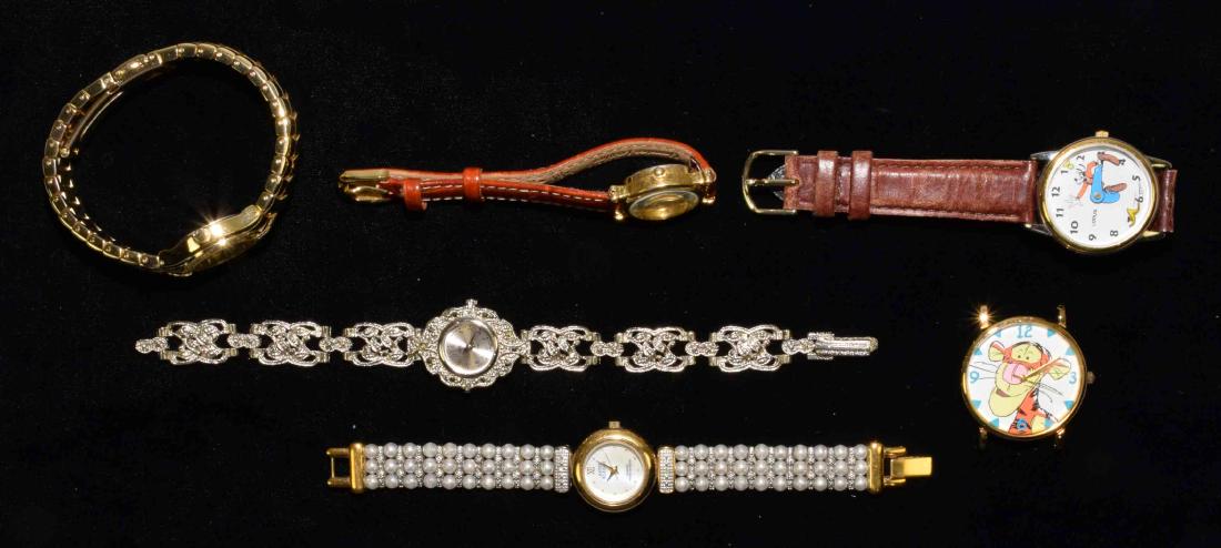 (6) ASST. WRISTWATCHES. Including (3) Disney character:: (6) ASST. WRISTWATCHES. Including (3) Disney character: Lorus, Timex and Armitron. (3) ladies: AK, LeBaron and Gruen (still works).