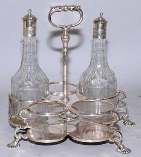 A PAIR OF SILVER-MOUNTED GLASS CRUET BOTTLES, 8 1/4 in: A PAIR OF SILVER-MOUNTED GLASS CRUET BOTTLES, 8 1/4 in high (each). A Sheffield-plated cruet stand, 9 1/4 in. high.