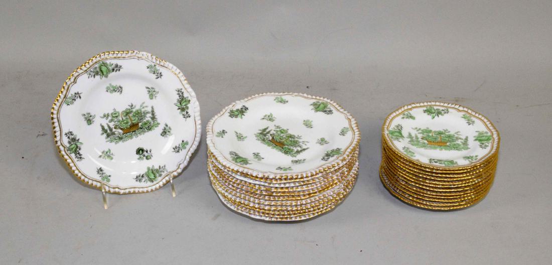 TWELVE ENGLISH (SPODE-COPELANDS) DESSERT PLATES, with: TWELVE ENGLISH (SPODE-COPELANDS) DESSERT PLATES, with transfer-printed floral basket design within gilt gadrooned borders. 8 in. diameter (each); together with twelve matching bread and butter plates,