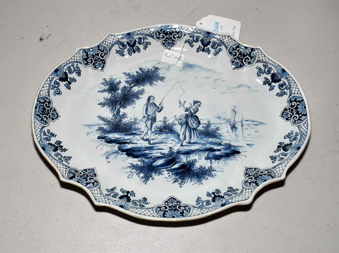 DELFT PLATTER, blue and white romantic scene. Marked: DELFT PLATTER, blue and white romantic scene. Marked ''LC'' on base 11.25W x 14''L.