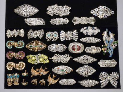 COLLECTION OF (30) ASST. VINTAGE ART DECO DUETTES,: COLLECTION OF (30) ASST. VINTAGE ART DECO DUETTES, including Coro (20 pc), Crown Trifari (1) and Kramer of NY (1) w/(8) unsigned pieces in gold and silver metal. With clear and colored rhinestones