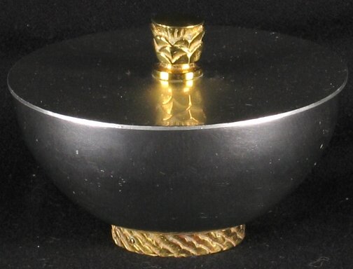 KENSINGTON THISTLETON DISH. 1934-1935. Art Deco K: KENSINGTON THISTLETON DISH. 1934-1935. Art Deco Kensington Ware aluminum and brass ''Thistleton covered dish'' cat. no. 7490. Designed by Lurelle Guild. Early mark. Marked: stag head and shield mark.