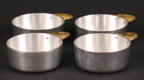 4 KENSINGTON WARE HEATHER DISHES. 1934-1935. Art: 4 KENSINGTON WARE HEATHER DISHES. 1934-1935. Art Deco aluminum and brass ''Heather candy and nut dishes'' cat. no. 7419. Designed by Lurelle Guild, patent applied for Nov. 6, 1934, patent issued April