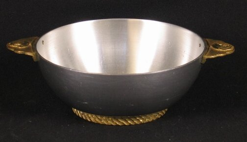 KENSINGTON WARE BRIAR BONBON DISH. 1934-1935. Art: KENSINGTON WARE BRIAR BONBON DISH. 1934-1935. Art Deco aluminum and brass ''Briar bon-Bon dish'' cat. no. 7419. Designed by Lurelle Guild, patent filed Nov. 6, 1934, patent issued April 16, 1935. Alum