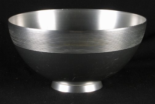 KENSINGTON HEMISPHERE BOWL. C.1937. Art Deco alum: KENSINGTON HEMISPHERE BOWL. C.1937. Art Deco aluminum ''Hemisphere Bowl'' cat. no. 7409. All aluminum designed by Lurelle Guild. Ringed line decoration around top rim. Marked: stag head, shield and sc
