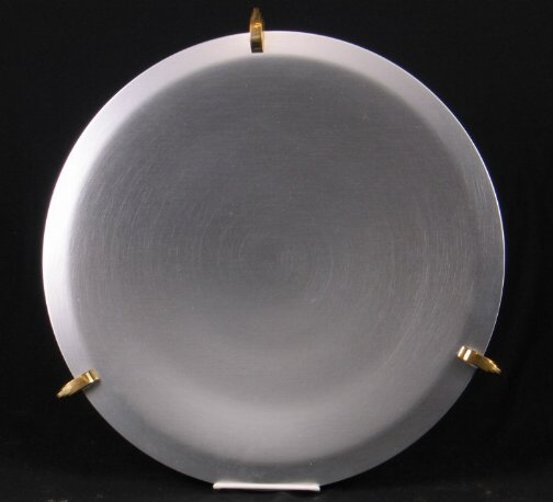 KENSINGTON WARE AZTEC PLATTER. 1938. Art Deco alu: KENSINGTON WARE AZTEC PLATTER. 1938. Art Deco aluminum and brass ''Aztec Footed Platter'' cat. no. 7105. Designed by Lurelle Guild, patent applied for April 13, 1938, patent issued June 7, 1938. alumi