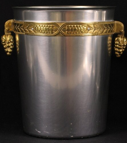 KENSINGTON WARE WINE COOLER. c.1935. Cat. no. 725: KENSINGTON WARE WINE COOLER. c.1935. Cat. no. 7250. Art Deco design by Lurelle Guild, Colchester Wine cooler, aluminum with brass trim band and pendant grape cluster handles. Marked: stag head over sh