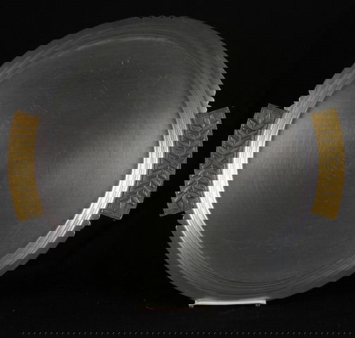 KENSINGTON LAUREL TRAY 15''. 1934-1935. Art Deco: KENSINGTON LAUREL TRAY 15''. 1934-1935. Art Deco Kensington Ware aluminum and brass ''Laurel Tray'' cat. no. 7109. Designed by Lurelle Guild, brass handles and shaped edge. Marked: stag head, shield a