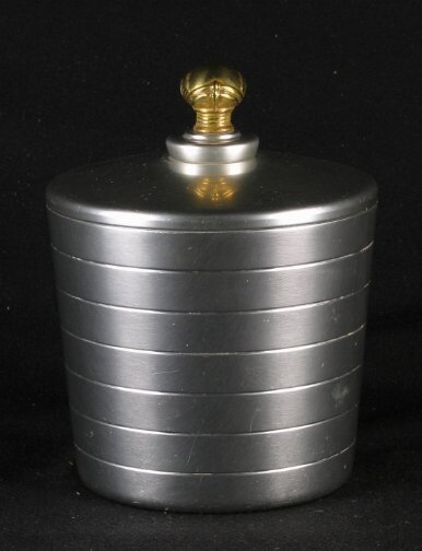KENSINGTON WARE SUSSEX JAR. 1934-1935. Art Deco a: KENSINGTON WARE SUSSEX JAR. 1934-1935. Art Deco aluminum and brass ''Sussex Candy or Tobacco Jar'' cat. no. 7471. Designed by Lurelle Guild, patent filed 10-11-1934, patent issued 1-1-1935. Early mark