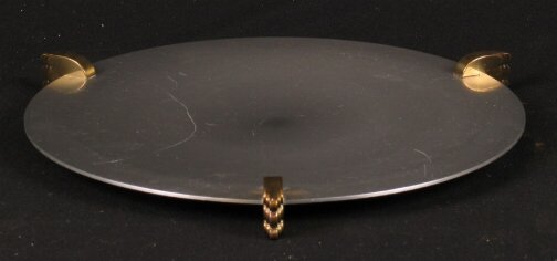 KENSINGTON WARE CORTEZ PLATTER. C. 1938. Art Deco: KENSINGTON WARE CORTEZ PLATTER. C. 1938. Art Deco aluminum and brass ''Cortez Footed Platter'' cat. no. 7106. Designed by Lurelle Guild, patent applied for April 13, 1938, patent issued June 7, 1938.
