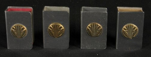 4 KENSINGTON CREST MATCHBOX HOLDERS. 1935. four A: 4 KENSINGTON CREST MATCHBOX HOLDERS. 1935. four Art Deco Kensington Ware aluminum and brass ''Crest Match Box Holders'' cat. no. 7605. Designed by Lurelle Guild. Three with early mark. marked: stag he