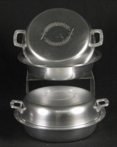 PR KENSINGTON WHITFIELD DISHES 1940. Pair of Art: PR KENSINGTON WHITFIELD DISHES 1940. Pair of Art Deco Kensington Ware aluminum ''Whitfield double serving dish'' cat. no. 7383. Designe by Lurelle Guild, patent applied for 2-28-1940, patent issued 4-