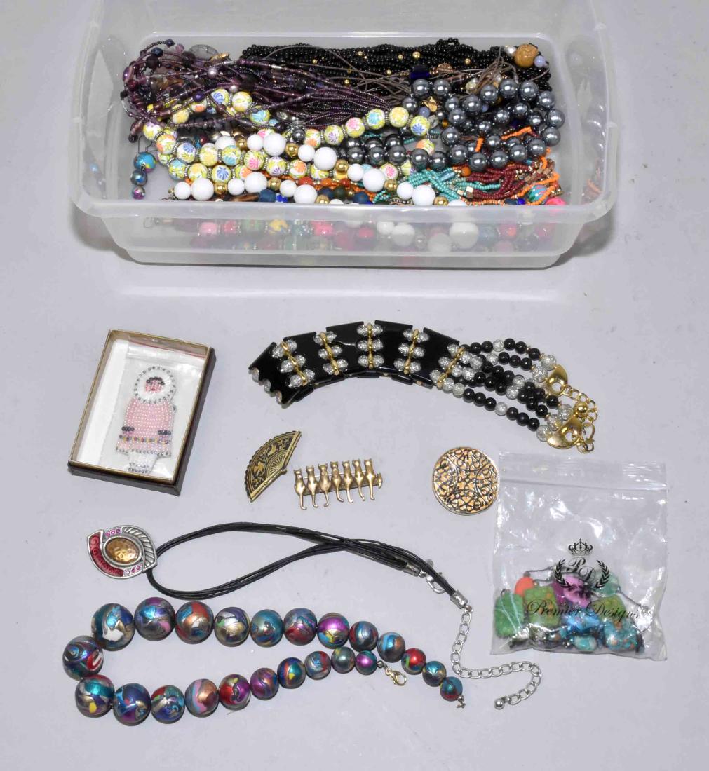 (2) PC. LOT OF ASST. BEADED LADIES COSTUME JEWELRY. In: (2) PC. LOT OF ASST. BEADED LADIES COSTUME JEWELRY. In multitones and colors and styles with necklaces, bracelets, earrings and pins.
