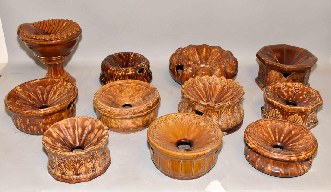 COLLECTION OF (11) VINTAGE BROWN STONEWARE SPITTOONS.: COLLECTION OF (11) VINTAGE BROWN STONEWARE SPITTOONS. Largest: 10'' diameter.