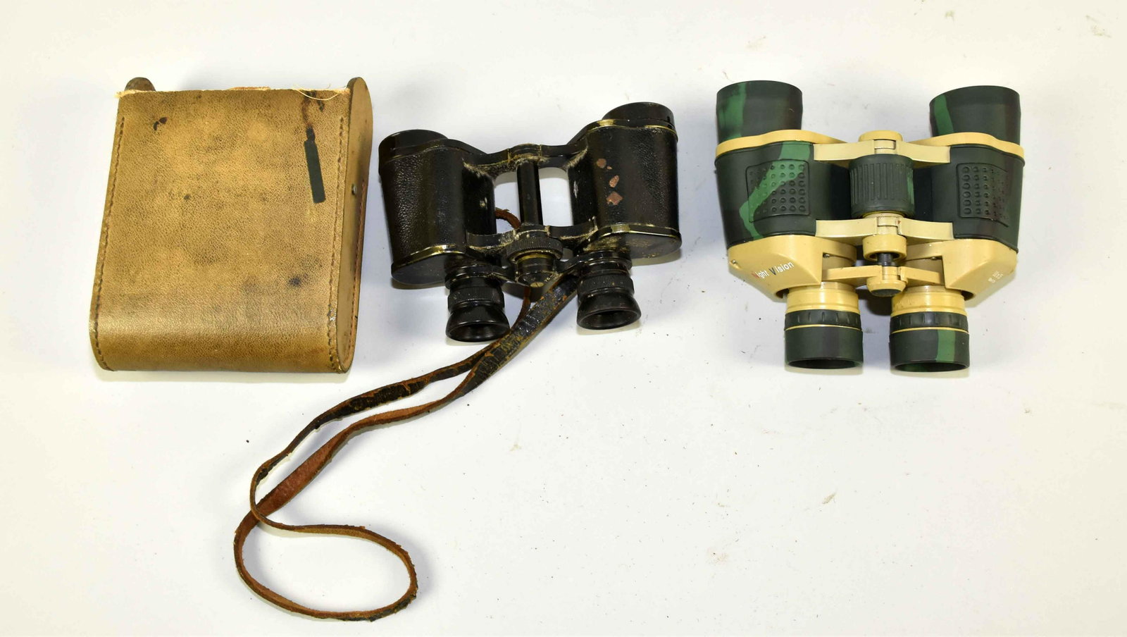 (2) PAIRS OF VINTAGE BINOCULARS. Night vision 10 x 35: (2) PAIRS OF VINTAGE BINOCULARS. Night vision 10 x 35 and Steinheil 6X30. Largest: 7''W x 6''L.