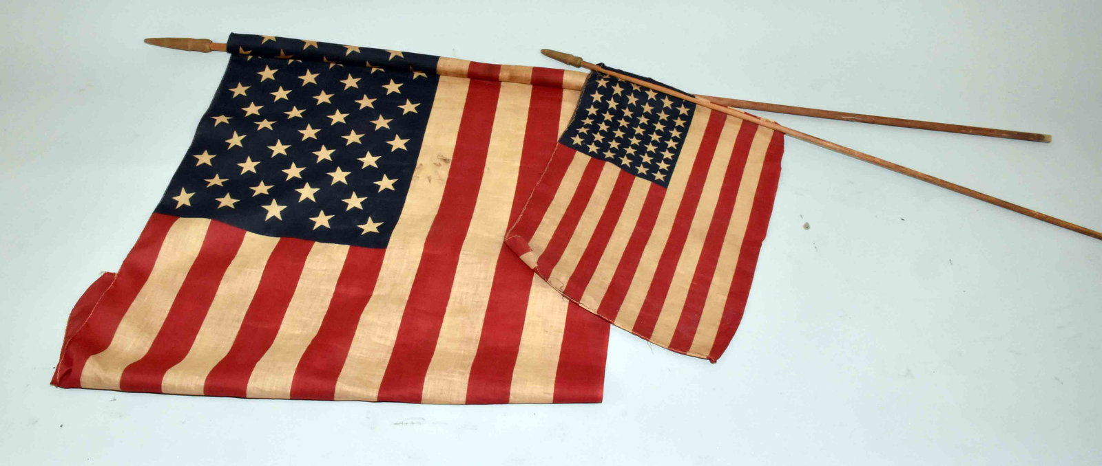(2) AMERICAN FLAGS, one w/48 stars. Largest: 50''H.: (2) AMERICAN FLAGS, one w/48 stars. Largest: 50''H.