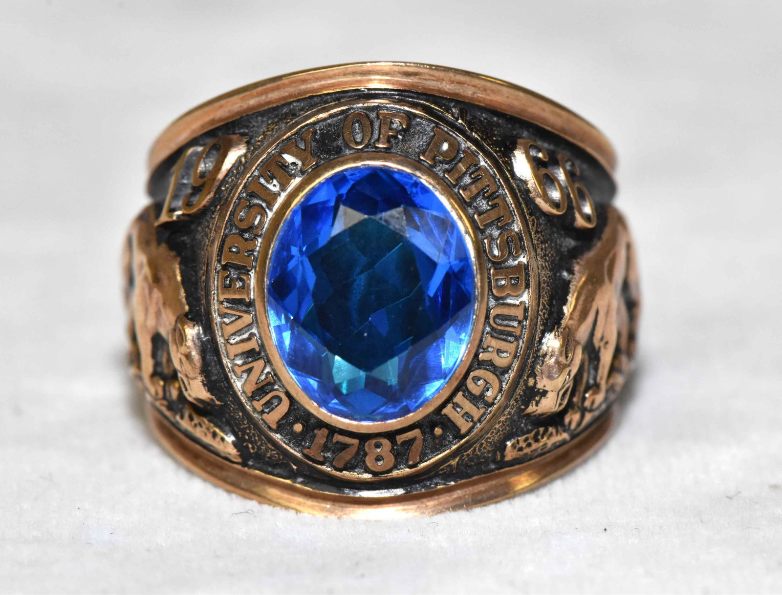 10K GOLD CLASS RING. With blue stone, University of: 10K GOLD CLASS RING. With blue stone, University of Pittsburgh 1963. 15.3 dwt. Estate of Stephen Totter.
