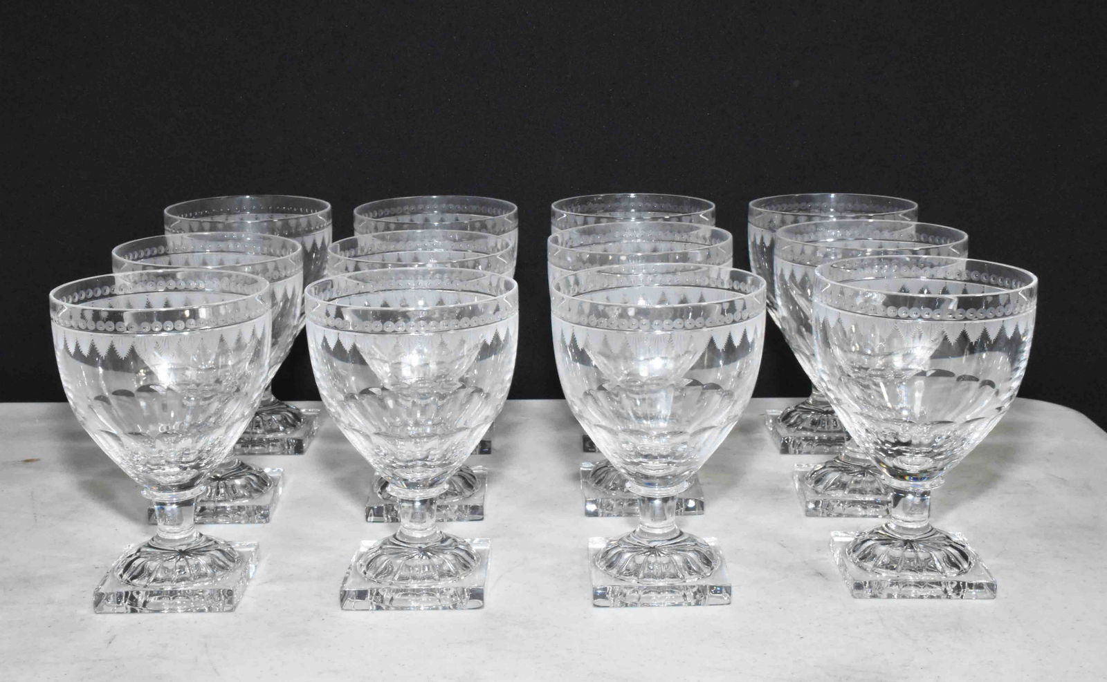 (12) WILLIAM YEOWARD FLAVIA CRYSTAL LARGE WINE GLASSES.: (12) WILLIAM YEOWARD FLAVIA CRYSTAL LARGE WINE GLASSES. English. All intricately hand engraved. 5.5''H. 10 oz. Condition: excellent. Purchased for $6,600.