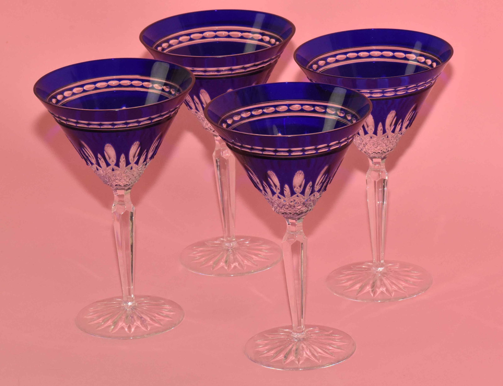 (4) WATERFORD SEAHORSE CRYSTAL ''Clarendon'' COBALT: (4) WATERFORD SEAHORSE CRYSTAL ''Clarendon'' COBALT MARTINI GLASSES. 7''H x 4.50'' diameter. Estate of Stephen Totter.