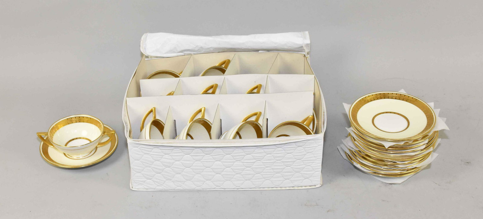 SET OF (11) MINTON PORCELAIN BOUILLON. Ivory/white: SET OF (11) MINTON PORCELAIN BOUILLON. Ivory/white w/gold band. 1 7/8''H x 5.50'' diameter. Numbered K108. Estate of Stephen Totter.
