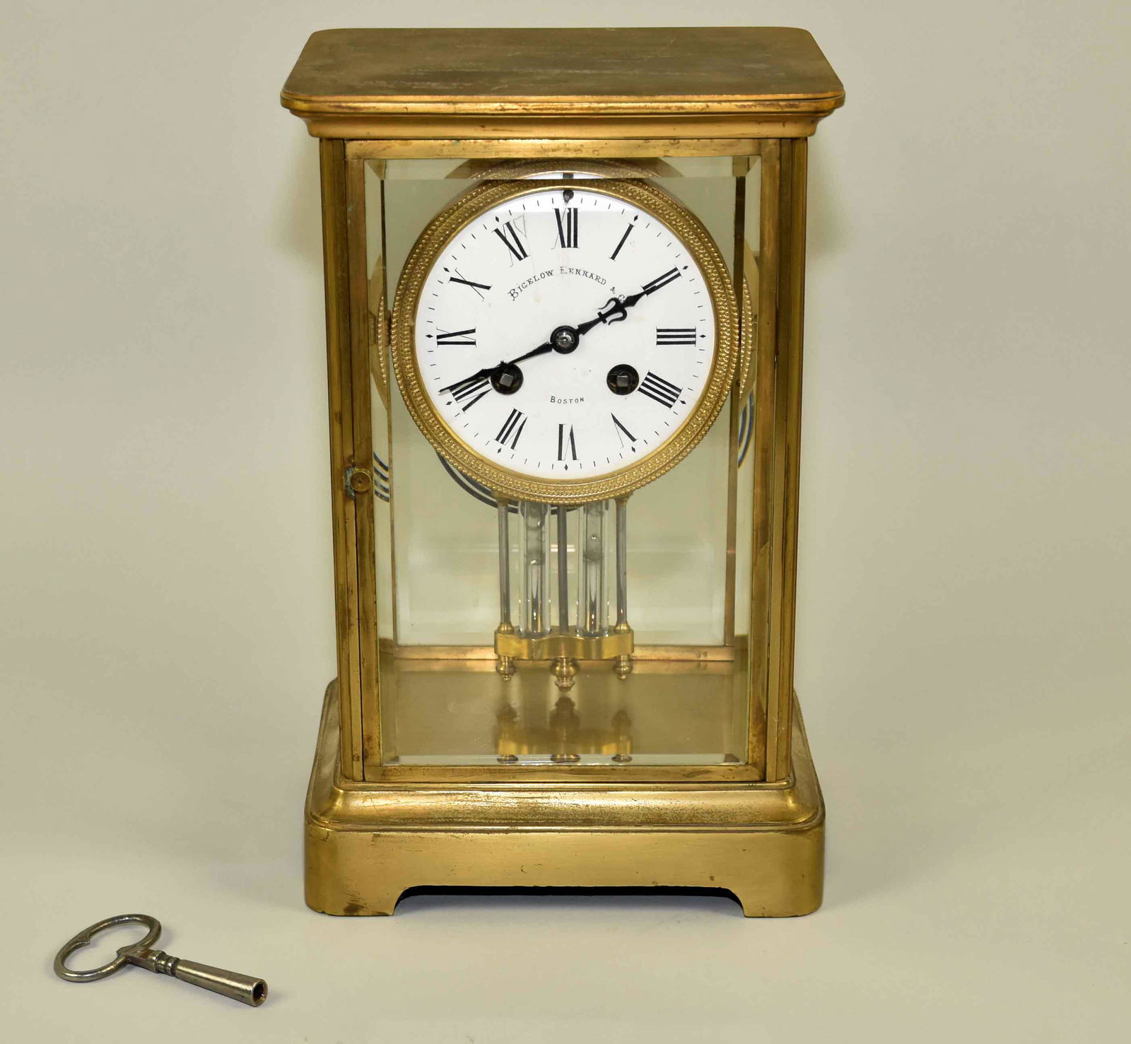 19TH C. FRENCH CRYSTAL REGULATOR CLOCK, Bigelow Kennard: 19TH C. FRENCH CRYSTAL REGULATOR CLOCK, Bigelow Kennard & Co., Boston, mercury pendulum and porcelain dial. Samuel Marti movement, 1889. 11''H x 7''W x 5.5''D.