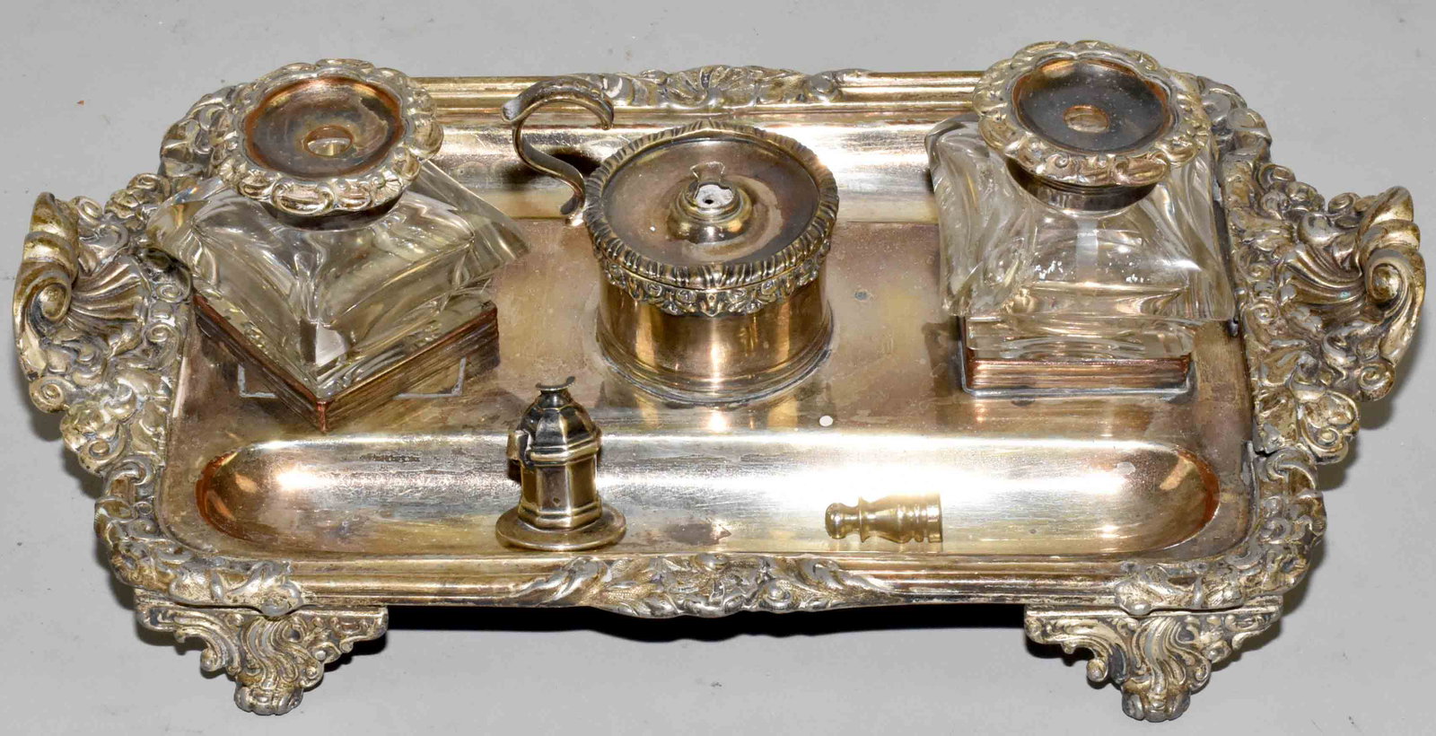 ANTIQUE SILVERPLATE INKWELL AND PEN HOLDER. 4''H x: ANTIQUE SILVERPLATE INKWELL AND PEN HOLDER. 4''H x 12''L x 7''W. Estate of Stephen Totter.