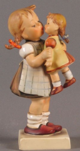 HUMMEL KISS ME FIGURE: HUMMEL KISS ME FIGURE Rare 311 Kiss me figure, lifelike doll with socks. Old style version. Redesigned at the request of the Siesson Convent to make the doll less life like and more doll like. Marked: