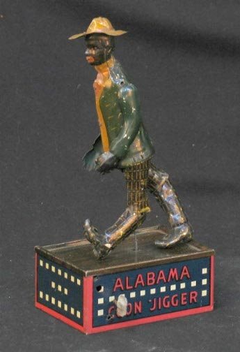 STRAUSS ALABAMA COON JIGGER TO: STRAUSS ALABAMA COON JIGGER TOMBA Strauss Mfg. Co. tin litho mechanical toy ''Tombo'' the Alabama Coon Jigger, wind up dancing figure. Marked: Trademark Strauss Mfg. Co. New York USA U.S. Pat. May 24,