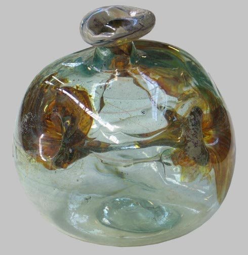 BRAMHALL ART GLASS SCULPTURE: BRAMHALL ART GLASS SCULPTURE. 1970. Free form hand blown art glass vessel with three interior connections, amber and brown floriform designs on body, narrow neck, made by Peter Bramhall, Vermont artis