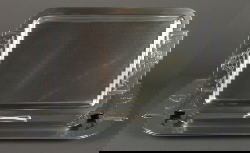 4 CLIPPER SHIP TRAYS: 4 CLIPPER SHIP TRAYS. Four Art Deco aluminum Kensington Ware Clipper Ship trays designed by Lurelle Guild, 1935-1936. Includes: (2) cat. no. 7152. Size: 22 3/4''L, 14 3/8''W. (2) cat. no. 7153. Size: