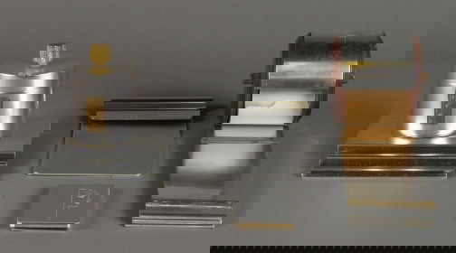 4 ART DECO ALUMINUM ITEMS: 4 ART DECO ALUMINUM ITEMS. Four Art Deco aluminum and brass Kensington Ware items. (1) Waverly ink and pen holder, cat. no. 7003, designed in 1934 by Lurelle Guild in 1934. Size: 4 1/4''H. (1) Jot-it