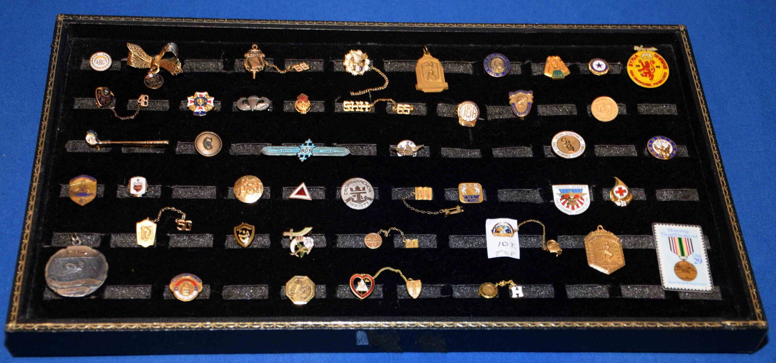 OVER (40) VINTAGE PINS, BUTTONS AND PENDANTS. Old: OVER (40) VINTAGE PINS, BUTTONS AND PENDANTS. Old collector lot includes military, award and advertisement jewelry in gold filled, enamel and mixed metal.