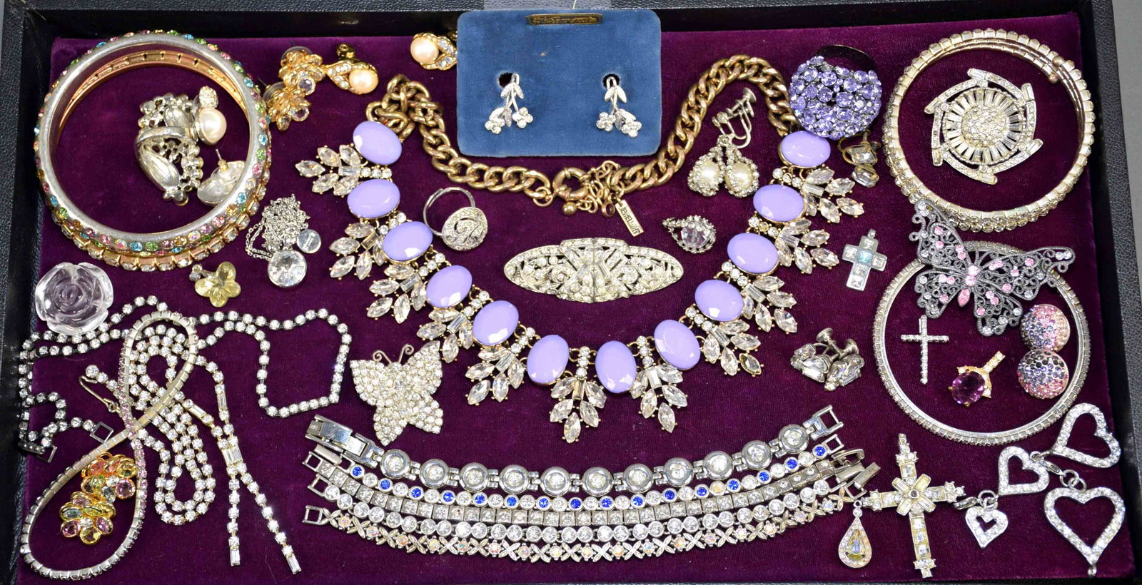 ASSORTED RHINESTONE COSTUME JEWELRY LOT - including: ASSORTED RHINESTONE COSTUME JEWELRY LOT - including tennis bracelets, earrings, pins, bangles and necklaces.
