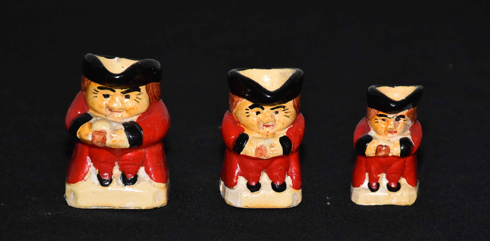ANTIQUE MINIATURE TOBY MUGS. Set of (3). Largest:: ANTIQUE MINIATURE TOBY MUGS. Set of (3). Largest: 2.25''H.