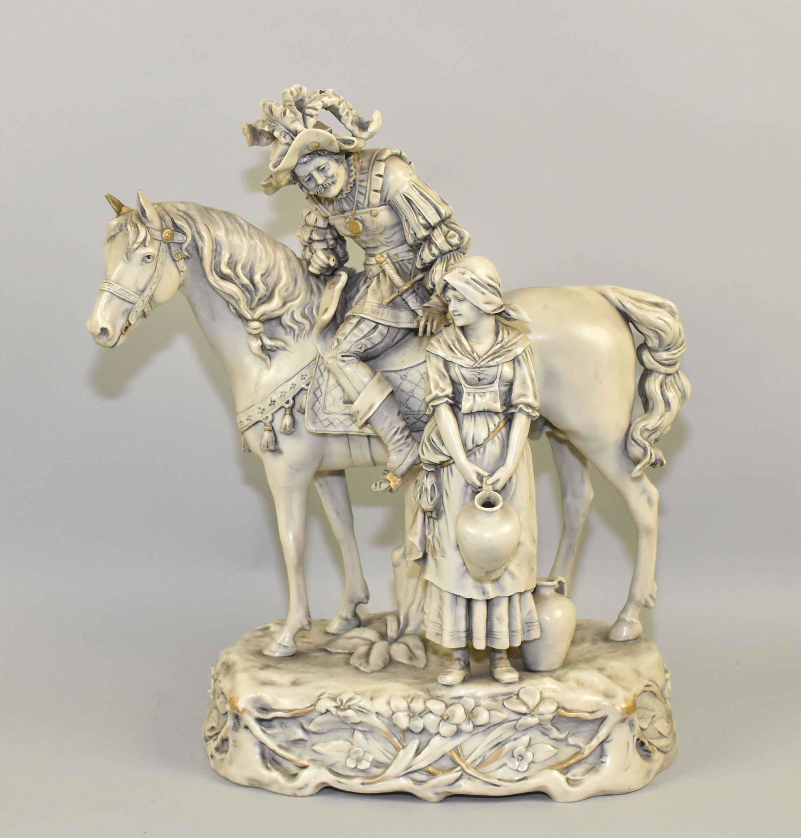 ROYAL DUX BOHEMIA PORCELAIN STATUE OF KNIGHT ON: ROYAL DUX BOHEMIA PORCELAIN STATUE OF KNIGHT ON HORSEBACK W/PEASANT GIRL. Fair condition - both ears chipped. 16''H x 13.50''W.