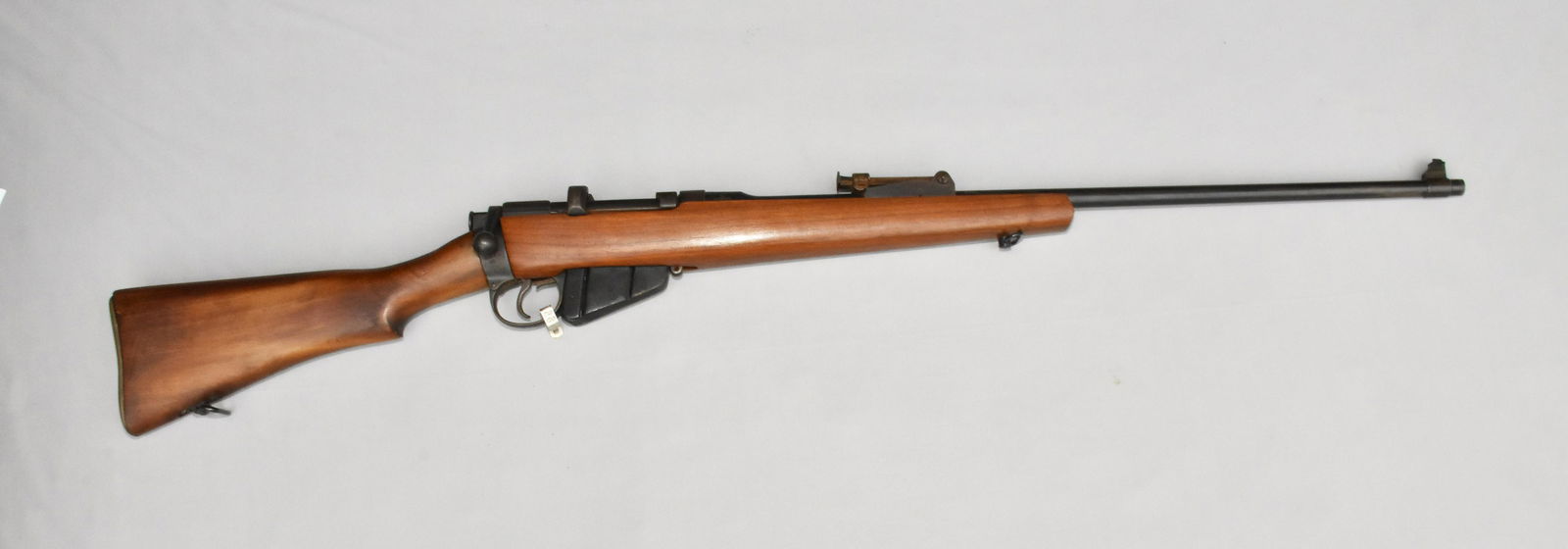 BRITISH SMLE LEE ENFIELD BOLT-ACTION RIFLE - #1. MK: BRITISH SMLE LEE ENFIELD BOLT-ACTION RIFLE - #1. MK III. Cal. 303 British. Mismatched bolt. Sporterized, stock re-shaprd, barrel original length. Serial #49580. Ships to your local FFL. Local pickup c