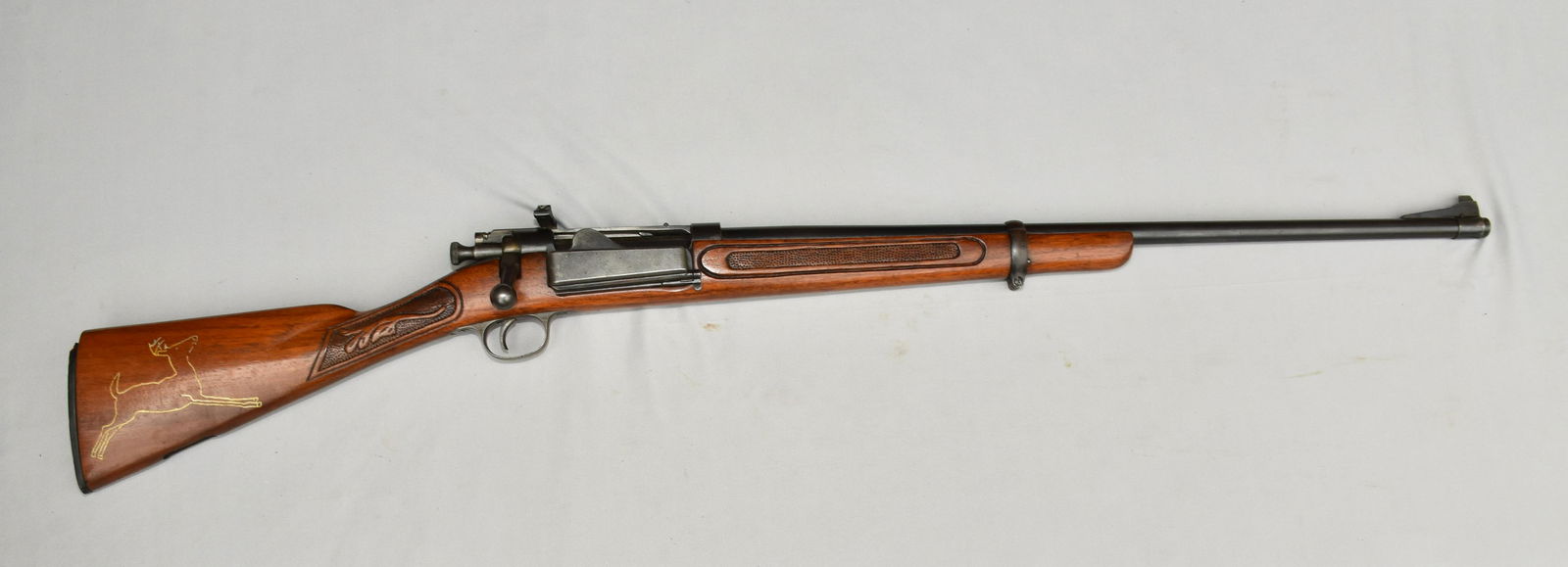 U.S. SPRINGFIELD MODEL 1898 BOLT-ACTION RIFLE - Cal.: U.S. SPRINGFIELD MODEL 1898 BOLT-ACTION RIFLE - Cal. 30-40 Krag. Krag action. Sporterized with stock and barrel shortened. Inlays and checkering in the wood. Serial #255146. Ships to your local FFL. L