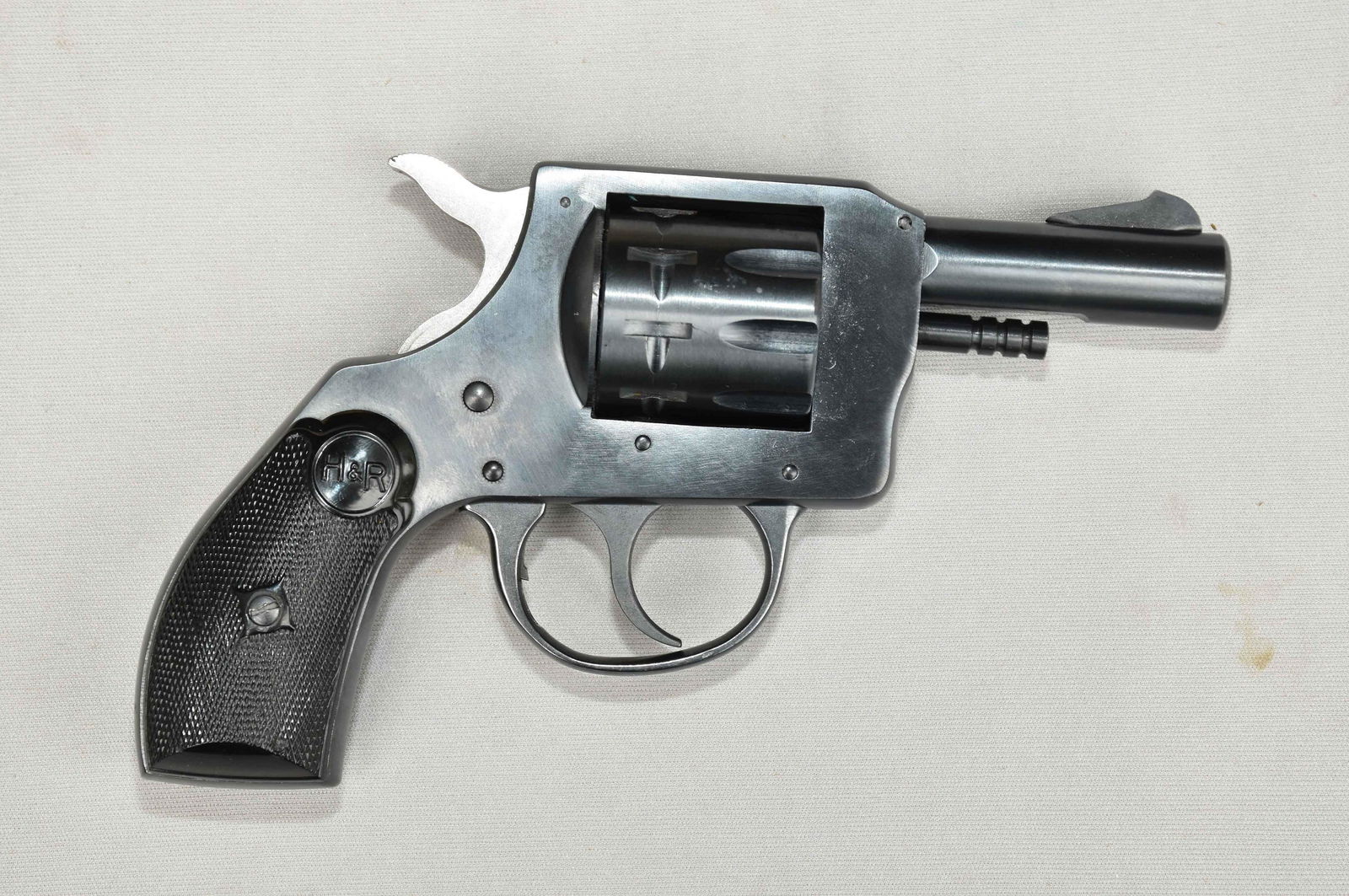 HARRINGTON & RICHARDSON .22 CAL. REVOLVER - Nine shot,: HARRINGTON & RICHARDSON .22 CAL. REVOLVER - Nine shot, 3'' barrel. Holster. Serial #AX153289. Ships to your local FFL. Local pickup can be arranged.