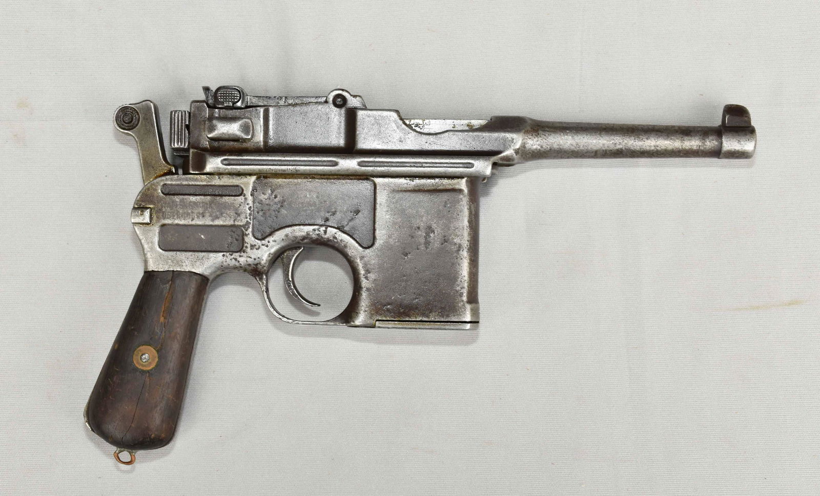 MAUSER MODEL C-96 ''BOLO'' BROOMHANDLE SEMI-AUTO: MAUSER MODEL C-96 ''BOLO'' BROOMHANDLE SEMI-AUTO PISTOL-Cal. 30 Mauser. Grey, heavily worn, missing the firing pin, mismatched serial numbers, import mark. Serial #695443. Ships to your local FFL. Loc