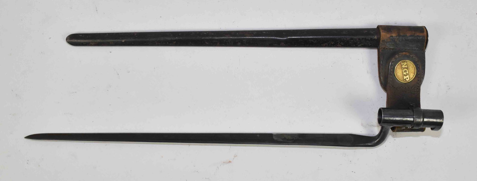 U.S. SOCKET BAYONET - for the Springfield Trapdoor: U.S. SOCKET BAYONET - for the Springfield Trapdoor 45/70 rifle. 18'' triangular blade with locking socket fixture. Fine bright blue finish with its steel sheath and attached frog and brass ''N.G.P.'' 