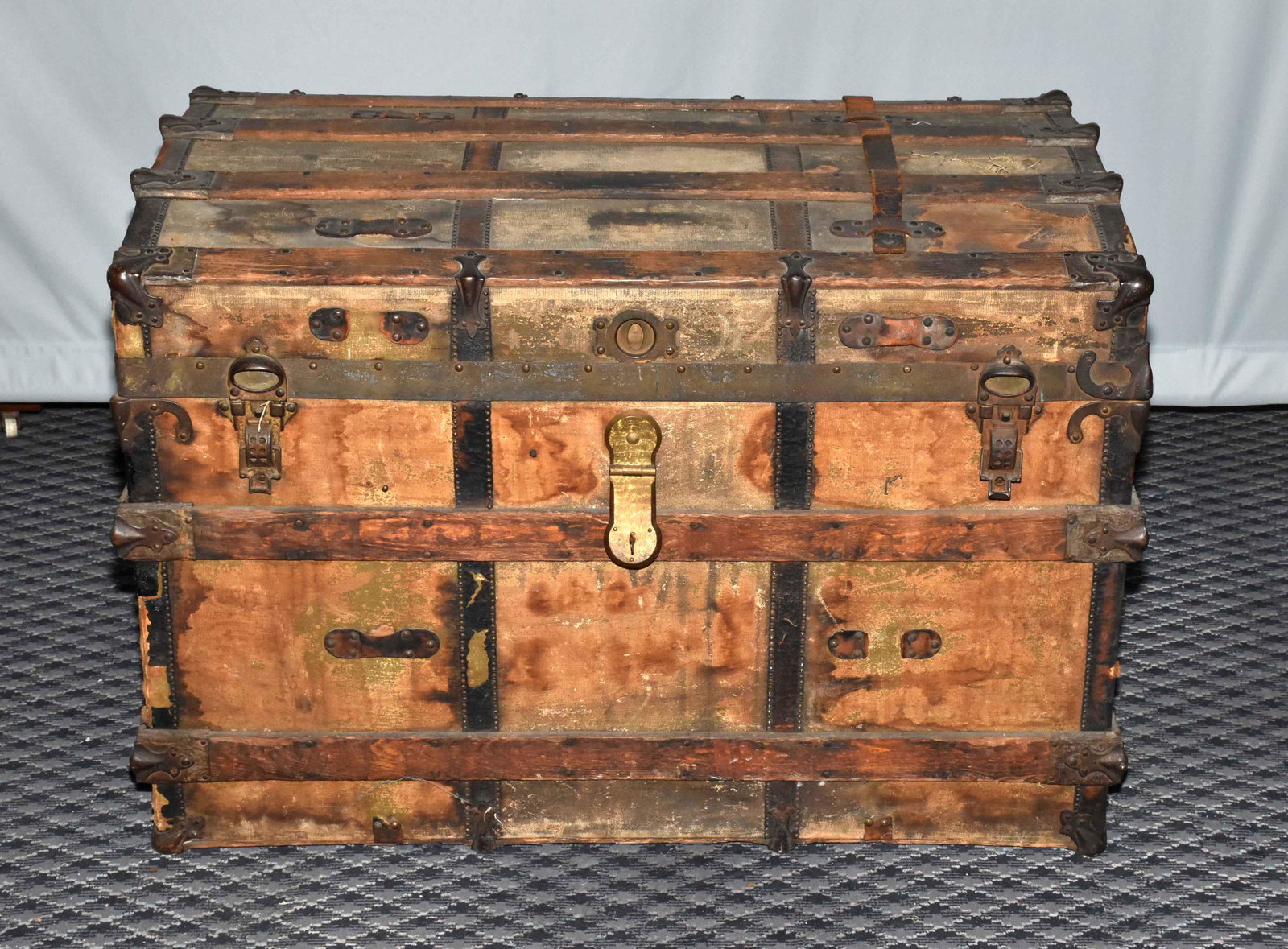 VINTAGE FRENCH STYLE TRAVEL TRUNK (1950s?) FURNITURE,: VINTAGE FRENCH STYLE TRAVEL TRUNK (1950s?) FURNITURE, in wood, canvas, sheet and iron, with lock and key. Various styles of wear and aging.