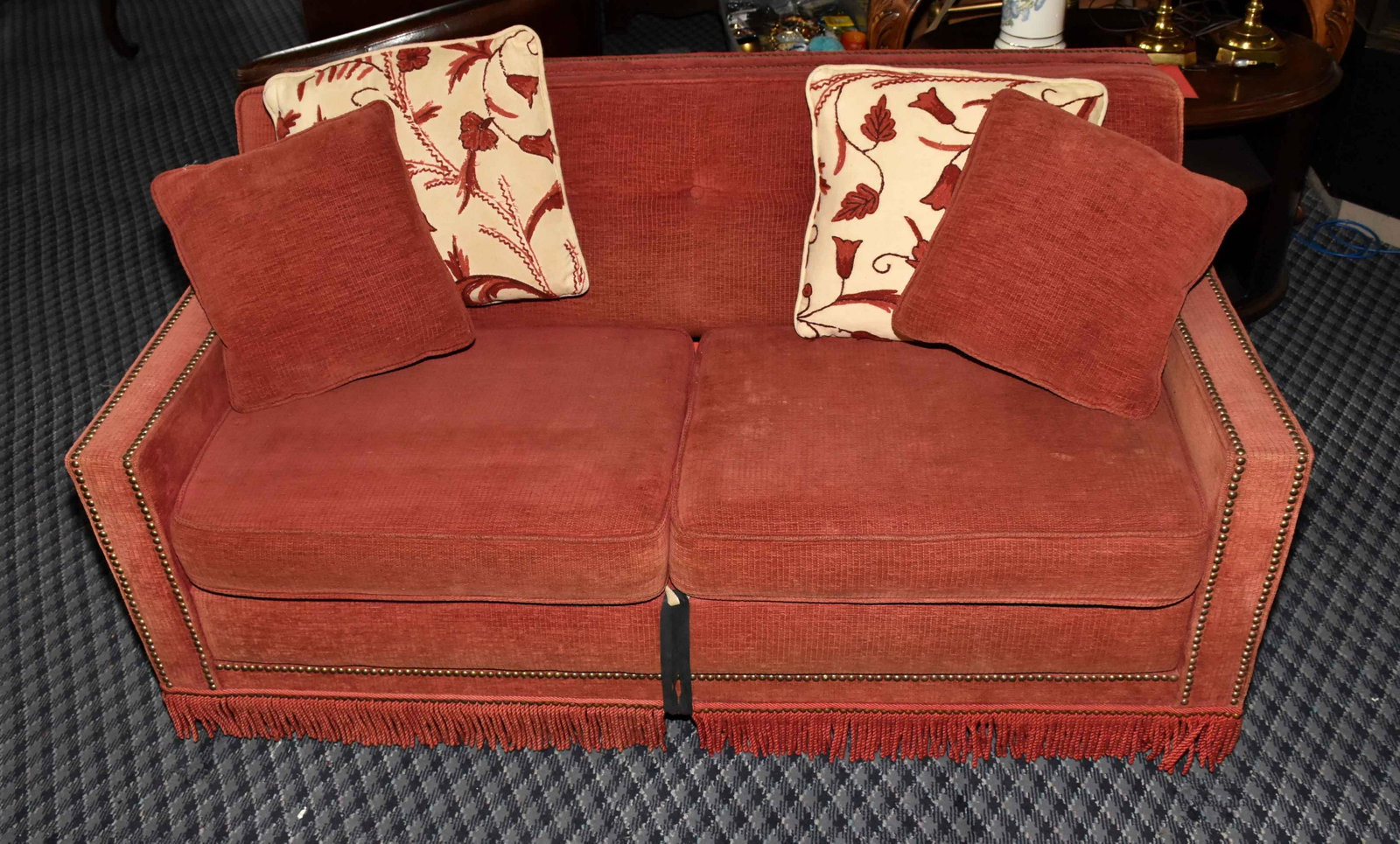 VINTAGE RED SLEEPER COUCH WITH FOUR PILLOWS. Used: VINTAGE RED SLEEPER COUCH WITH FOUR PILLOWS. Used condition 30''H x 60''W x 35.5'' deep.