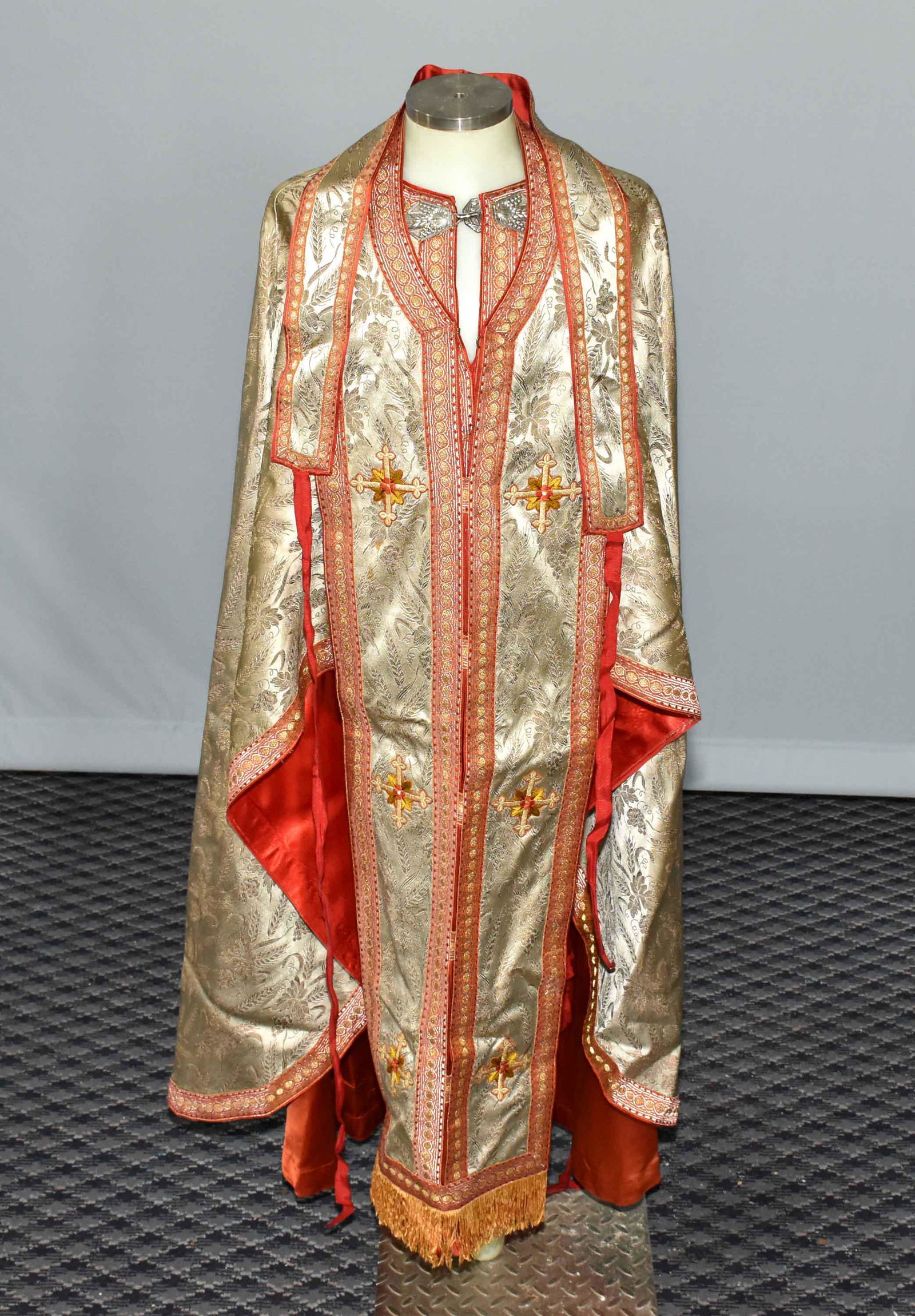 TURN OF THE CENTURY BYZANTINE CATHOLIC PRIEST'S 3 PIECE: TURN OF THE CENTURY BYZANTINE CATHOLIC PRIEST'S 3 PIECE COPE. Heavily brocaded with stiched crosses and finely stitched and painted figure of Jesus holding a lamb and staff surrounded with velvet incl