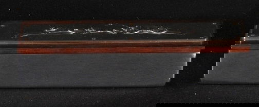 KENSINGTON WARE CIGARETTE BOX: KENSINGTON WARE CIGARETTE BOX. Art Deco aluminum and wood ''Coach 'N Four cigarette box'' cat. no. 7547. Designed by Lurelle Guild. Repousse decoration, two dividers. Marked: stag head, shield and scr