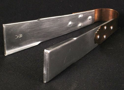 KENSINGTON WARE ICE TONGS: KENSINGTON WARE ICE TONGS. 1934. Original Art Deco Kensington Ware ''Coldchester Tongs'' designed by Lurelle Guild. Patent filed October 11, 1934. Patent issued December 25.1934. Copper and aluminum.