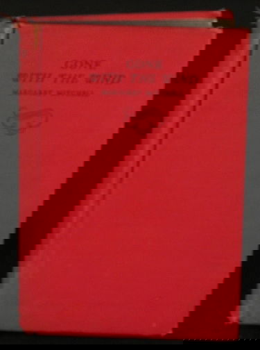 GONE WITH THE WIND, 1943 ED.: GONE WITH THE WIND, MARGARET MITCHELL. Macmillian Co., 1943, no d/j, red cloth with black, spine loose, previous owners name inside cover, and first page, 1037 ppg., contents are clean.