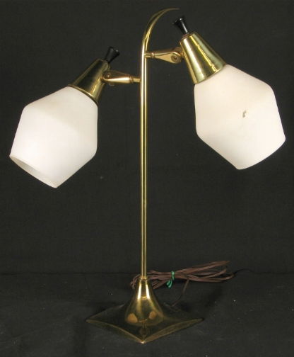 1970S TABLE LAMP: 1970S TABLE LAMP. 1970s table lamp, Brass table lamp with two adjustable milk glass shades attached to center brass stem with curved top. No mark. Size: 21 1/2''H, 12''W, 6''D. Condition: minor wear t